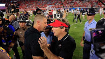 Florida Gators head coach Billy Napier, left, and Georgia Bulldogs head coach Kirby Smart shake hands after the game of an NCAA Football game Saturday, Oct. 28, 2023 at EverBank Stadium in Jacksonville, Fla. Georgia defeated Florida 43-20. [Corey Perrine/Florida Times-Union]