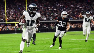 Oct 24, 2021; Paradise, Nevada, USA; Philadelphia Eagles wide receiver Jalen Reagor (18) scores a touchdown against the Las Vegas Raiders during the second half at Allegiant Stadium. Mandatory Credit: Gary A. Vasquez-USA TODAY Sports