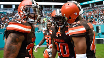 Sep 25, 2016; Miami Gardens, FL, USA; Cleveland Browns cornerback Briean Boddy-Calhoun (center) celebrates his interception returned for a touchdown with Browns cornerback Tracy Howard (right) and Browns free safety Jordan Poyer (left) during the first half against the Miami Dolphins at Hard Rock Stadium. Mandatory Credit: Steve Mitchell-USA TODAY Sports