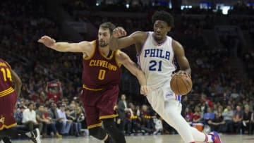 PHILADELPHIA, PA - NOVEMBER 27: Joel Embiid #21 of the Philadelphia 76ers drives to the basket against Kevin Love #0 of the Cleveland Cavaliers in the first quarter at Wells Fargo Center on November 27, 2016 in Philadelphia, Pennsylvania. NOTE TO USER: User expressly acknowledges and agrees that, by downloading and or using this photograph, User is consenting to the terms and conditions of the Getty Images License Agreement. (Photo by Mitchell Leff/Getty Images)