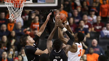 Nov 26, 2016; Brooklyn, NY, USA; Syracuse Orange guard Andrew White III (3) rebounds against South Carolina Gamecocks forward Sedee Keita (24) and forward Maik Kotsar (21) during the second half of the Brooklyn Hoops Holiday Invitational at Barclays Center. South Carolina won, 64-50. Mandatory Credit: Vincent Carchietta-USA TODAY Sports