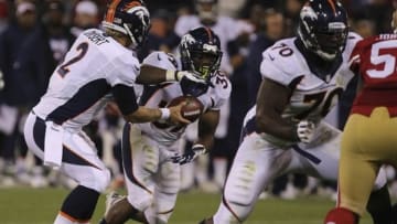 Aug 8, 2013; San Francisco, CA, USA; Denver Broncos quarterback Zac Dysert (2) hands off the ball to running back C.J. Anderson (39) during the fourth quarter at Candlestick Park. The Denver Broncos defeated the San Francisco 49ers 10-6. Mandatory Credit: Kelley L Cox-USA TODAY Sports