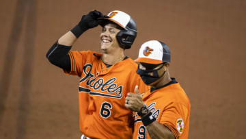 BALTIMORE, MD - AUGUST 22: Ryan Mountcastle #6 of the Baltimore Orioles celebrates after his first career hit during the ninth inning against the Boston Red Sox at Oriole Park at Camden Yards on August 22, 2020 in Baltimore, Maryland. (Photo by Scott Taetsch/Getty Images)