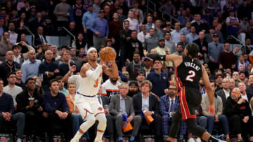 May 2, 2023; New York, New York, USA; New York Knicks guard Josh Hart (3) shoots a three point shot against Miami Heat guard Gabe Vincent (2) during the fourth quarter of game two of the 2023 NBA Eastern Conference semifinal playoffs at Madison Square Garden. Mandatory Credit: Brad Penner-USA TODAY Sports