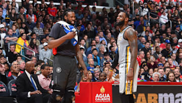 LOS ANGELES, CA - MARCH 9: DeAndre Jordan #6 of the LA Clippers and LeBron James #23 of the Cleveland Cavaliers talk during the game on March 9, 2018 at STAPLES Center in Los Angeles, California. NOTE TO USER: User expressly acknowledges and agrees that, by downloading and/or using this Photograph, user is consenting to the terms and conditions of the Getty Images License Agreement. Mandatory Copyright Notice: Copyright 2018 NBAE (Photo by Andrew D. Bernstein/NBAE via Getty Images)