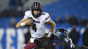 UK defensive end Josh Paschal tackles South Carolina quarterback Luke Doty during the University of Kentucky football game against South Carolina at Kroger Field in Lexington, Kentucky, on Saturday, Dec. 5, 2020.Kentucky Football South Carolina