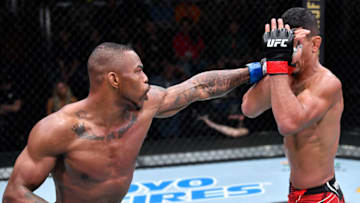LAS VEGAS, NEVADA - NOVEMBER 13: (L-R) Khaos Williams punches Miguel Baeza in a welterweight fight during the UFC Fight Night event at UFC APEX on November 13, 2021 in Las Vegas, Nevada. (Photo by Chris Unger/Zuffa LLC)