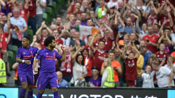 DUBLIN, IRELAND - AUGUST 04: Mohamed Salah of Liverpool celebrates with team mates after scoring during the international friendly game between Liverpool and Napoli at Aviva Stadium on August 4, 2018 in Dublin, Ireland. (Photo by Charles McQuillan/Getty Images)