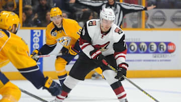 Apr 7, 2016; Nashville, TN, USA; Arizona Coyotes center Laurent Dauphin (76) skates the puck into the offensive zone during the second period against the Nashville Predators at Bridgestone Arena. Mandatory Credit: Christopher Hanewinckel-USA TODAY Sports