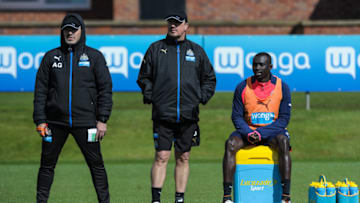 NEWCASTLE UPON TYNE, ENGLAND - APRIL 18: Newcastle's Manager Rafael Benitez (C) watches training with Papiss Cisse (R) and Newcastle Coach Antonio Gomez Perez (L) during the Newcastle United Training session at The Newcastle United Training Centre on April 18, 2016, in Newcastle upon Tyne, England. (Photo by Serena Taylor/Newcastle United via Getty Images)