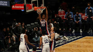 NEW YORK, NY - DECEMBER 16 : Tobias Harris (12) of Philadelphia 76ers and Nic Claxton (33) of Brooklyn Nets in action during NBA match between Philadelphia 76ers and Brooklyn Nets held at Barclays Center in Brooklyn, New York, United States on December 16, 2021. (Photo by Tayfun Coskun/Anadolu Agency via Getty Images)