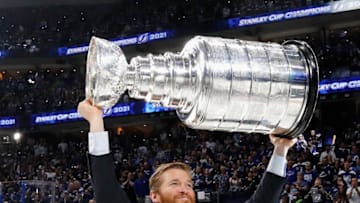 TAMPA, FLORIDA - JULY 07: Jeff Halpern, Assistant Coach of the Tampa Bay Lightning celebrates with the Stanley Cup following the victory over the Montreal Canadiens in Game Five of the 2021 NHL Stanley Cup Final at the Amalie Arena on July 07, 2021 in Tampa, Florida. The Lightning defeated the Canadiens 1-0 to take the series four games to one. (Photo by Bruce Bennett/Getty Images)