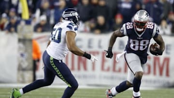 Nov 13, 2016; Foxborough, MA, USA; New England Patriots tight end Martellus Bennett (88) evades Seattle Seahawks outside linebacker K.J. Wright (50) during the fourth quarter at Gillette Stadium. The Seattle Seahawks won 31-24. Mandatory Credit: Greg M. Cooper-USA TODAY Sports
