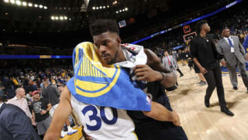 OAKLAND, CA - NOVEMBER 8: Stephen Curry #30 of the Golden State Warriors and Jimmy Butler #23 of the Minnesota Timberwolves speak after game on November 8, 2017 at ORACLE Arena in Oakland, California. NOTE TO USER: User expressly acknowledges and agrees that, by downloading and or using this photograph, user is consenting to the terms and conditions of Getty Images License Agreement. Mandatory Copyright Notice: Copyright 2017 NBAE (Photo by Noah Graham/NBAE via Getty Images)