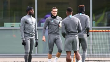 ENFIELD, ENGLAND: Harry Winks speaks to Tanguy Ndombele, Gedson Fernandes and Serge Aurier of Tottenham Hotspur during the Tottenham Hotspur training session at The Tottenham Hotspur Training Centre on March 09, 2020 in Enfield, England. Tottenham Hotspur will face RB Leipzig in their UEFA Champions League round of 16 second leg match on March 10, 2020. (Photo by Alex Morton/Getty Images)