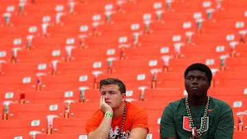 MIAMI, FL - SEPTEMBER 13: Miami Hurricanes fans look on during a game against the Arkansas State Red Wolves at Sunlife Stadium on September 13, 2014 in Miami, Florida. (Photo by Mike Ehrmann/Getty Images)