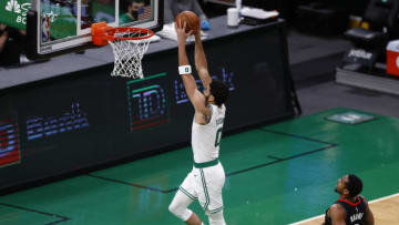 BOSTON, MASSACHUSETTS - APRIL 02: Jayson Tatum #0 of the Boston Celtics dunks during the first half of the game against the Houston Rockets at TD Garden on April 02, 2021 in Boston, Massachusetts. NOTE TO USER: User expressly acknowledges and agrees that, by downloading and or using this photograph, User is consenting to the terms and conditions of the Getty Images License Agreement. (Photo by Omar Rawlings/Getty Images)