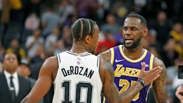 SAN ANTONIO,TX - NOVEMBER 03: LeBron James #23 of the Los Angeles Lakers hugs DeMar DeRozan #10 of the San Antonio Spurs at the end of the game at AT&T Center on November 03, 2019 in San Antonio, Texas. NOTE TO USER: User expressly acknowledges and agrees that , by downloading and or using this photograph, User is consenting to the terms and conditions of the Getty Images License Agreement. (Photo by Ronald Cortes/Getty Images)
