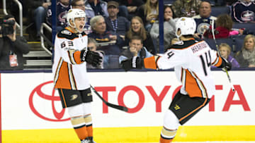 COLUMBUS, OH - DECEMBER 01: Anaheim Ducks left wing Kevin Roy (63) celebrates with Anaheim Ducks center Adam Henrique (14) after scoring a goal during the second period in a game between the Columbus Blue Jackets and the Anaheim Ducks on December 01, 2017, at Nationwide Arena in Columbus, OH.(Photo by Adam Lacy/Icon Sportswire via Getty Images)