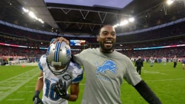 Oct 26, 2014; London, UNITED KINGDOM; Detroit Lions receiver Calvin Johnson (right) celebrates with receiver Corey Fuller (10) after the NFL International Series game against the Atlanta Falcons at Wembley Stadium. The Lions defeated the Falcons 22-21. Mandatory Credit: Kirby Lee-USA TODAY Sports