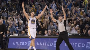 December 5, 2016; Oakland, CA, USA; Golden State Warriors guard Klay Thompson (11) celebrates after scoring a three-point basket against the Indiana Pacers during the third quarter at Oracle Arena. The Warriors defeated the Pacers 142-106. Mandatory Credit: Kyle Terada-USA TODAY Sports