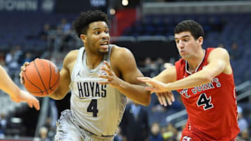 Jan 9, 2017; Washington, DC, USA; Georgetown Hoyas guard Jagan Mosely (4) dribbles past St. John's Red Storm guard Federico Mussini (4) during the first half at Verizon Center. Mandatory Credit: Brad Mills-USA TODAY Sports