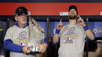 Nov 2, 2016; Cleveland, OH, USA; Chicago Cubs manager Joe Maddon (left) holds the commissioner