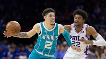Apr 2, 2022; Philadelphia, Pennsylvania, USA; Charlotte Hornets guard LaMelo Ball (2) drives past Philadelphia 76ers guard Matisse Thybulle (22) during the first quarter at Wells Fargo Center. Mandatory Credit: Bill Streicher-USA TODAY Sports