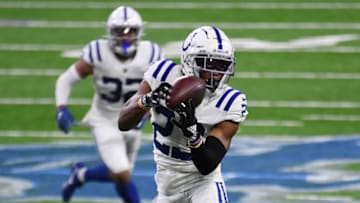DETROIT, MICHIGAN - NOVEMBER 01: Kenny Moore II #23 of the Indianapolis Colts intercepts a pass from Matthew Stafford #9 of the Detroit Lions (not pictured) and returns it for a touchdown during the fourth quarter at Ford Field on November 01, 2020 in Detroit, Michigan. (Photo by Nic Antaya/Getty Images)