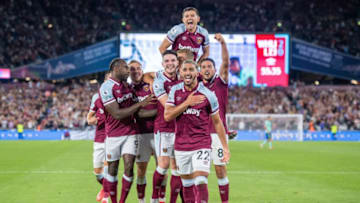Said Benrahma of West Ham celebrate with Declan Rice, Aaron Cresswell, Michail Antonio. (Photo by Sebastian Frej/MB Media/Getty Images)