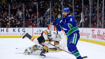 VANCOUVER, BC - DECEMBER 19: Vancouver Canucks Defenseman Christopher Tanev (8) celebrates after scoring an overtime goal on Vegas Golden Knights Goalie Marc-Andre Fleury (29) during their NHL game at Rogers Arena on December 19, 2019 in Vancouver, British Columbia, Canada. (Photo by Derek Cain/Icon Sportswire via Getty Images)