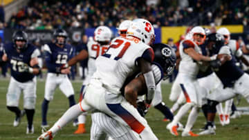 NEW YORK, NY - NOVEMBER 17: Chase Claypool #83 of the Notre Dame Fighting Irish runs for a touchdown as he is defended by Trill Williams #21 of the Syracuse Orange during their game at Yankee Stadium on November 17, 2018 in New York, New York. (Photo by Jeff Zelevansky/Getty Images)