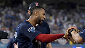 LOS ANGELES, CA - OCTOBER 26: Eduardo Nunez #36 of the Boston Red Sox celebrates his thirteenth inning catch against the Los Angeles Dodgers in Game Three of the 2018 World Series at Dodger Stadium on October 26, 2018 in Los Angeles, California. (Photo by Harry How/Getty Images)