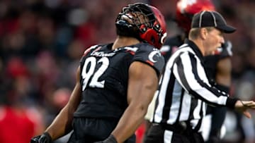 Cincinnati Bearcats defensive lineman Curtis Brooks celebrates after a sack against the SMU Mustangs. The Enquirer.