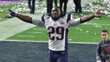 Feb 1, 2015; Glendale, AZ, USA; New England Patriots running back LeGarrette Blount (29) celebrates after the game against the Seattle Seahawks in Super Bowl XLIX at University of Phoenix Stadium. The Patriots defeated the Seahawks 28-24. Mandatory Credit: Matt Kartozian-USA TODAY Sports