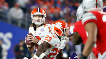 GLENDALE, ARIZONA - DECEMBER 28: Quarterback Trevor Lawrence #16 of the Clemson Tigers looks to pass against the Ohio State Buckeyes during the first half of the College Football Playoff Semifinal at the PlayStation Fiesta Bowl at State Farm Stadium on December 28, 2019 in Glendale, Arizona. (Photo by Ralph Freso/Getty Images)
