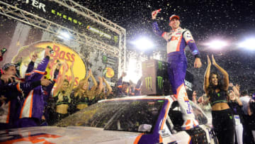 BRISTOL, TENNESSEE - AUGUST 17: Denny Hamlin, driver of the #11 FedEx Freight Toyota, celebrates in Victory Lane after winning the Monster Energy NASCAR Cup Series Bass Pro Shops NRA Night Race at Bristol Motor Speedway on August 17, 2019 in Bristol, Tennessee. (Photo by Jared C. Tilton/Getty Images)