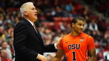 Jan 17, 2015; Pullman, WA, USA; Oregon State Beavers guard Gary Payton II (1) talks with Oregon State Beavers head coach Wayne Tinkle during a game against the Washington State Cougars at Wallis Beasley Performing Arts Coliseum. The Beaver won 62-47. Mandatory Credit: James Snook-USA TODAY Sports