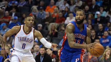 Nov 27, 2015; Oklahoma City, OK, USA; Detroit Pistons forward Marcus Morris (13) drives to the basket against Oklahoma City Thunder guard Russell Westbrook (0) during the second quarter at Chesapeake Energy Arena. Mandatory Credit: Mark D. Smith-USA TODAY Sports