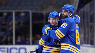 Sep 27, 2022; Buffalo, New York, USA; Buffalo Sabres left wing Brandon Biro (17) celebrates his gaol with right wing Alex Tuch (89) during the second period against the Philadelphia Flyers at KeyBank Center. Mandatory Credit: Timothy T. Ludwig-USA TODAY Sports