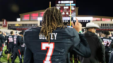 LUBBOCK, TEXAS - NOVEMBER 23: Quarterback Jett Duffey #7 of the Texas Tech Red Raiders stands on the field after the college football game against the Kansas State Wildcats on November 23, 2019 at Jones AT&T Stadium in Lubbock, Texas. (Photo by John E. Moore III/Getty Images)