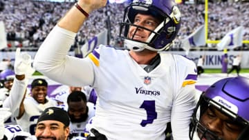 MINNEAPOLIS, MINNESOTA - DECEMBER 24: Greg Joseph #1 of the Minnesota Vikings celebrates with teammates after kicking a game winning 61 yard field goal as time expired to beat the New York Giants 27-24 at U.S. Bank Stadium on December 24, 2022 in Minneapolis, Minnesota. (Photo by Stephen Maturen/Getty Images)