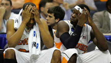 CHARLOTTE, NC - MARCH 27: (L-R) J.P. Prince #30 and Duke Crews #32 of the Tennessee Volunteers sit on the court in the final minutes against the Louisville Cardinals during the 2008 NCAA Men's East Regional Semifinal at Bobcats Arena on March 27, 2008 in Charlotte, North Carolina. The Cardinals defeated the Volunteers 77-60. (Photo by Streeter Lecka/Getty Images)