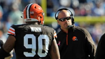 Oct 5, 2014; Nashville, TN, USA; Cleveland Browns head coach Mike Pettine greets Cleveland Browns defensive end Billy Winn (90) after taking the lead against the Tennessee Titans late in the second half at LP Field. Cleveland won 29-28. Mandatory Credit: Jim Brown-USA TODAY Sports