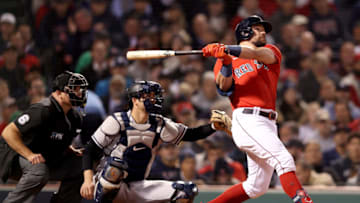 BOSTON, MASSACHUSETTS - OCTOBER 05: Kyle Schwarber #18 of the Boston Red Sox watches his home run against the New York Yankees during the third inning of the American League Wild Card game at Fenway Park on October 05, 2021 in Boston, Massachusetts. (Photo by Maddie Meyer/Getty Images)