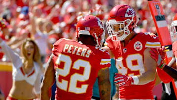 Aug 13, 2016; Kansas City, MO, USA; Kansas City Chiefs cornerback Marcus Peters (22) is congratulated by defensive back Daniel Sorensen (49) after Peters