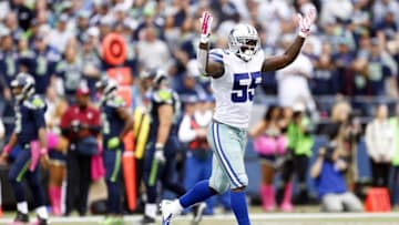 Oct 12, 2014; Seattle, WA, USA; Dallas Cowboys middle linebacker Rolando McClain (55) celebrates after a failed fourth down play by the Seattle Seahawks during the fourth quarter of a 26-20 Dallas victory at CenturyLink Field. Mandatory Credit: Joe Nicholson-USA TODAY Sports