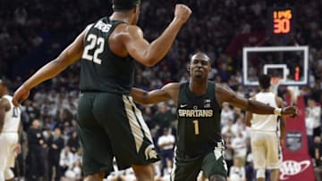 Jan 7, 2017; University Park, PA, USA; Michigan State Spartans guard Miles Bridges (22) celebrates a blocked shot with guard Joshua Langford (1) during the second half against the Penn State Nittany Lions at Palestra. Penn State won 72-63. Mandatory Credit: Derik Hamilton-USA TODAY Sports