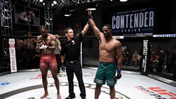 LAS VEGAS, NV - JULY 25: (R-L) Karl Roberson celebrates his knockout victory over Ryan Spann in their light heavyweight bout during Dana White's Tuesday Night Contender Series at the TUF Gym on July 25, 2017 in Las Vegas, Nevada. (Photo by Brandon Magnus/DWTNCS)