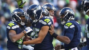 Nov 22, 2015; Seattle, WA, USA; Seattle Seahawks wide receiver Tyler Lockett (16) celebrates his touchdown reception against the San Francisco 49ers with wide receiver Jermaine Kearse (15) and quarterback Russell Wilson (3) during the second quarter at CenturyLink Field. Mandatory Credit: Joe Nicholson-USA TODAY Sports